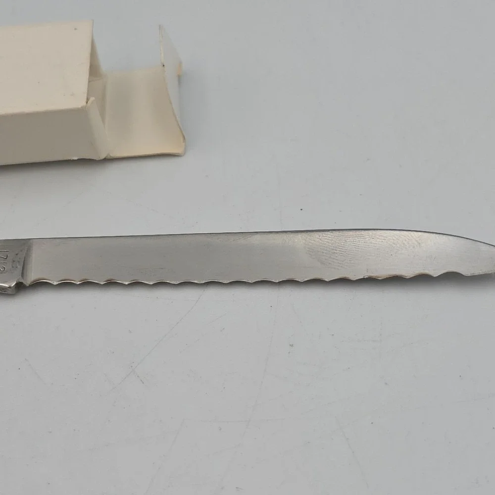 Utica vintage stainless